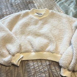 Cropped fluffy white sweater.